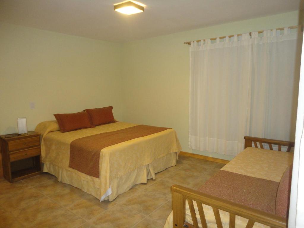 Unquehue Apartamentos Dormis Villa La Angostura Room photo